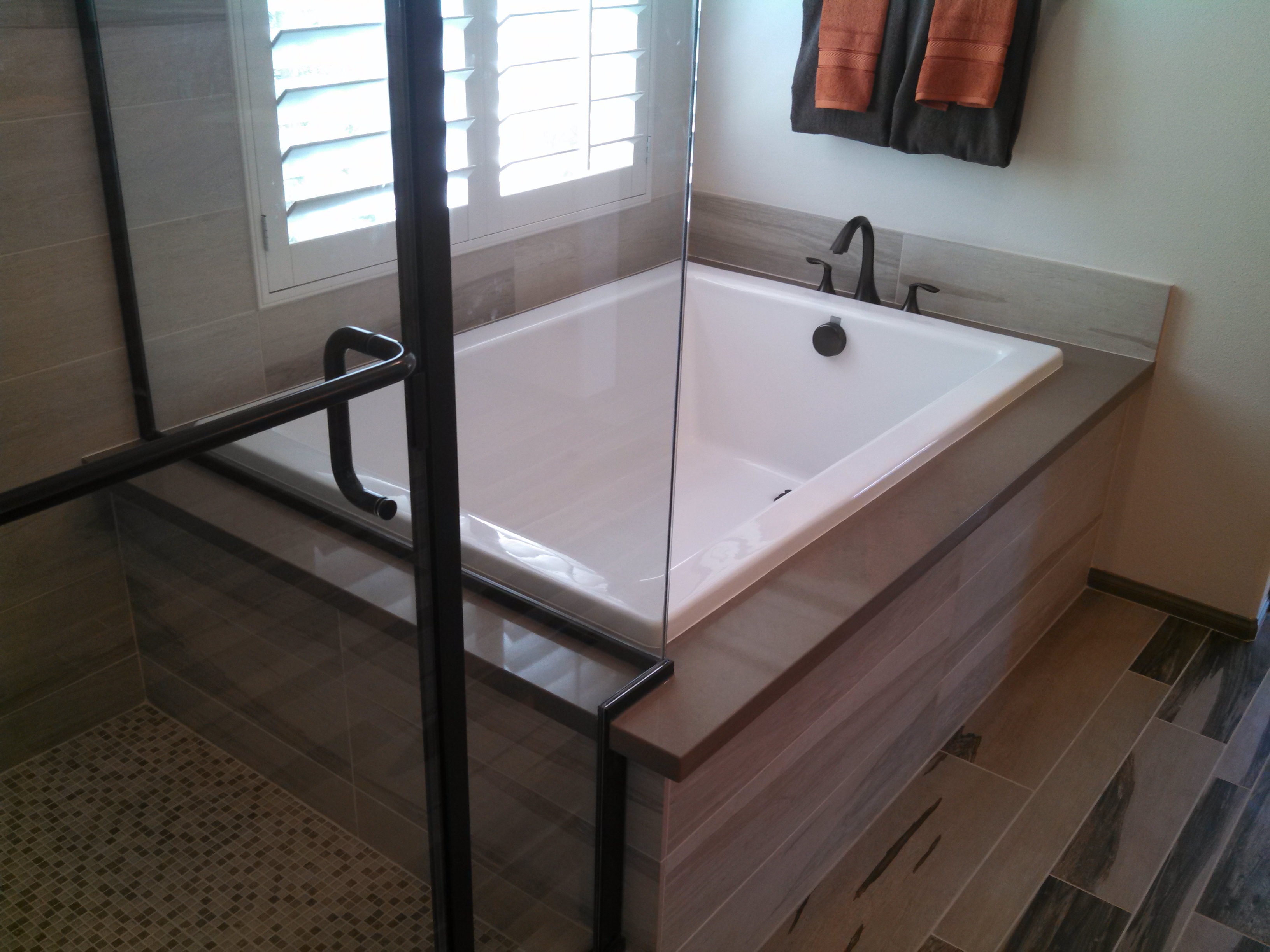 This is an example of how one leading national builder has incorporated Aquatic's new, contemporary tub into a striking bathroom design.