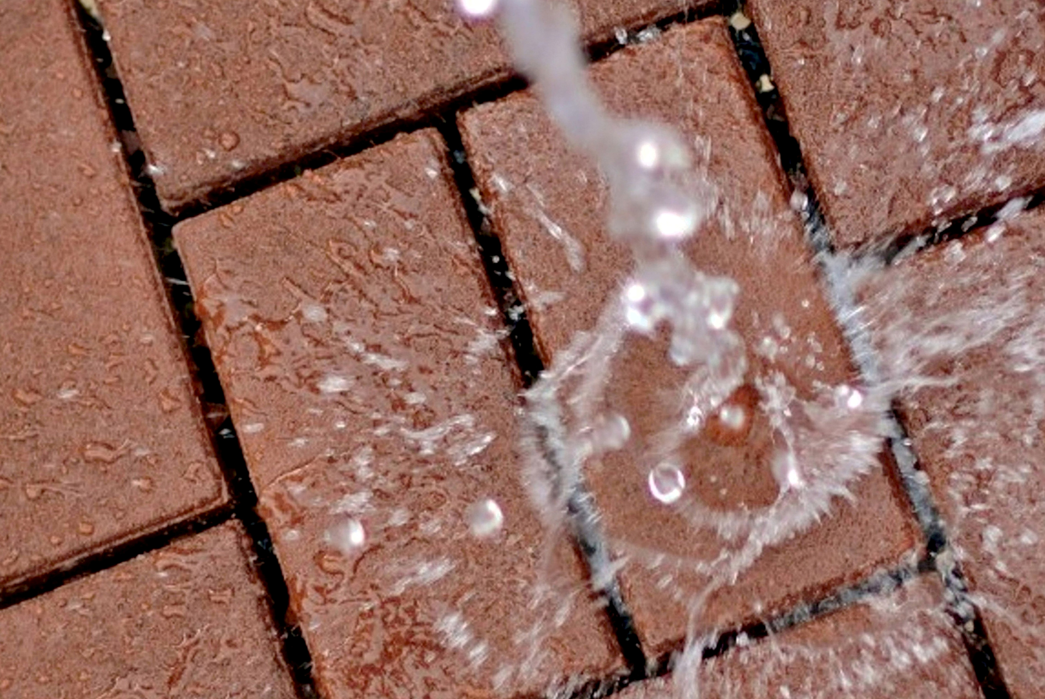 AZEK Pavers in Permeable style can help reduce storm water runoff.