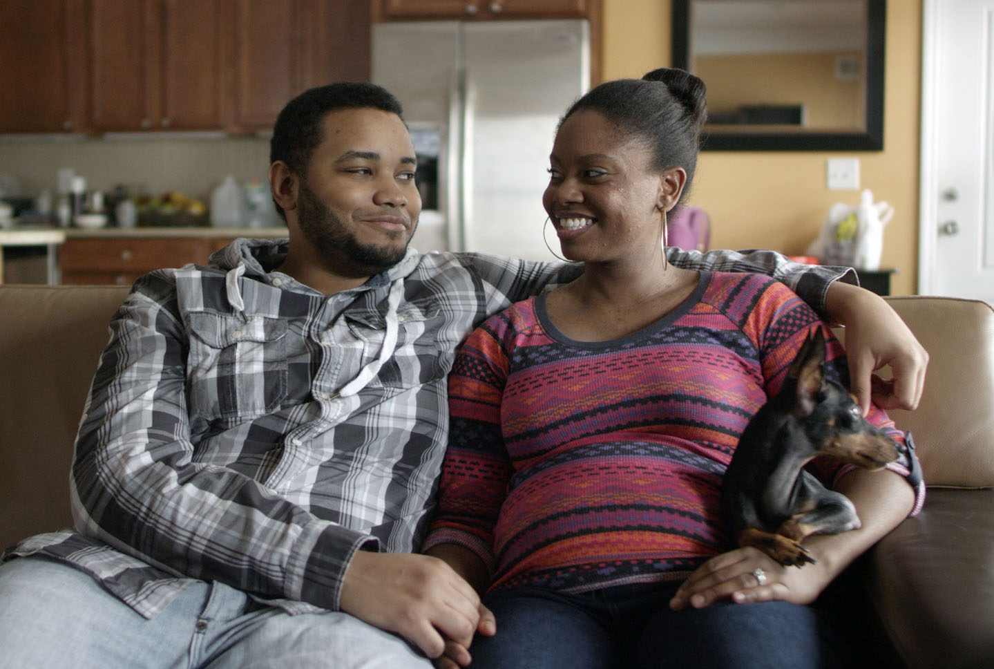 An expectant couple from 40 Weeks share their excitement on camera.