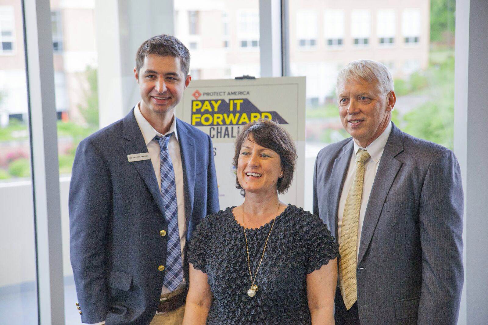 University of South Alabama President Dr. Tony G. Waldrop, Protect America Corporate Communications Manager Tim Krebs and American Red Cross Communications Officer Martha Duvall at the Pay It Forward