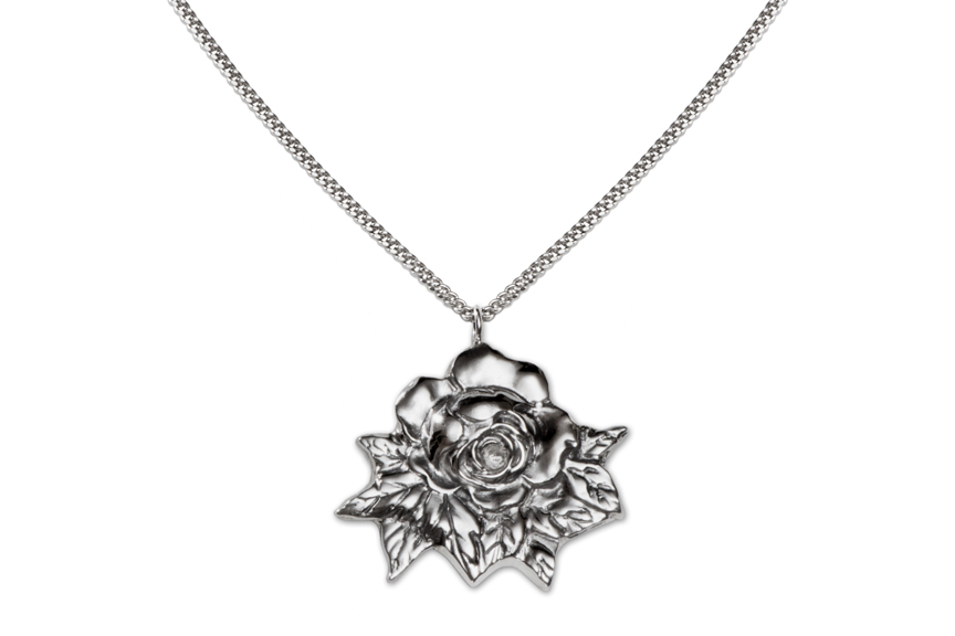 The Garden Rose Pendant captures the leafy charm of a current bridal favorite.