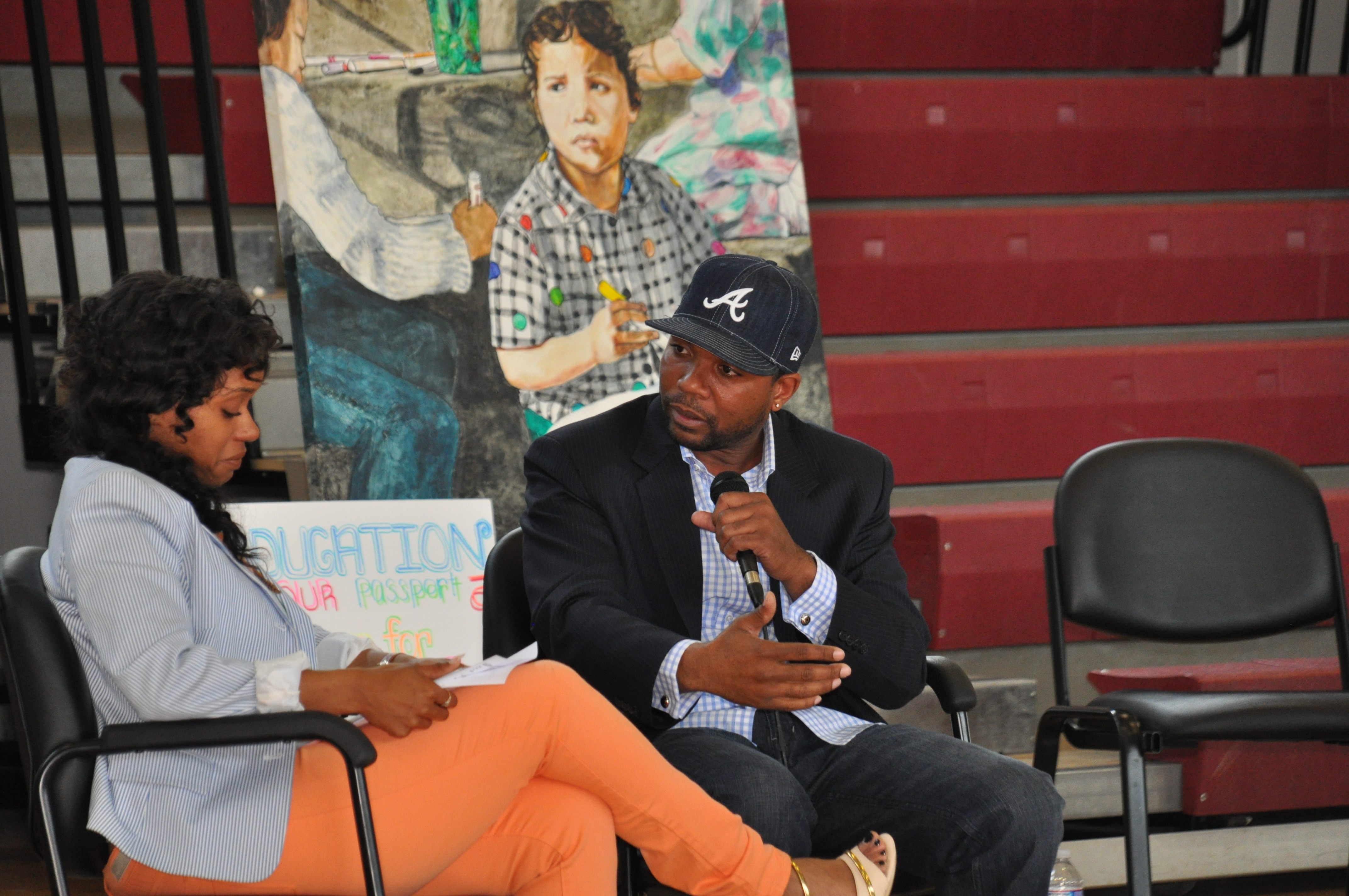 Grammy-award-winning producer/songwriter Carvin Haggins (right) answers a question from Syreeta Martin, journalist and consultant (left), during a question-and-answer session at Chester Community Char