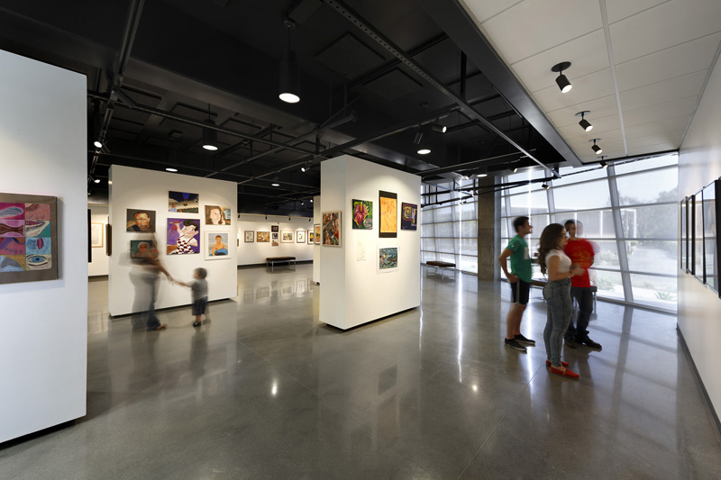 A gallery of work by community artists welcomes visitors on the ground floor of the building, which will eventually act as a gateway to the community.