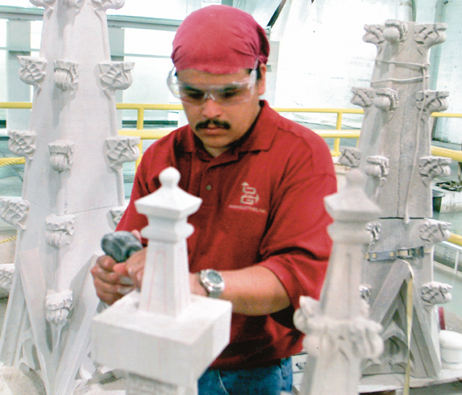 O&G's staff artist finishes the restoration of Trinity College pinnacle