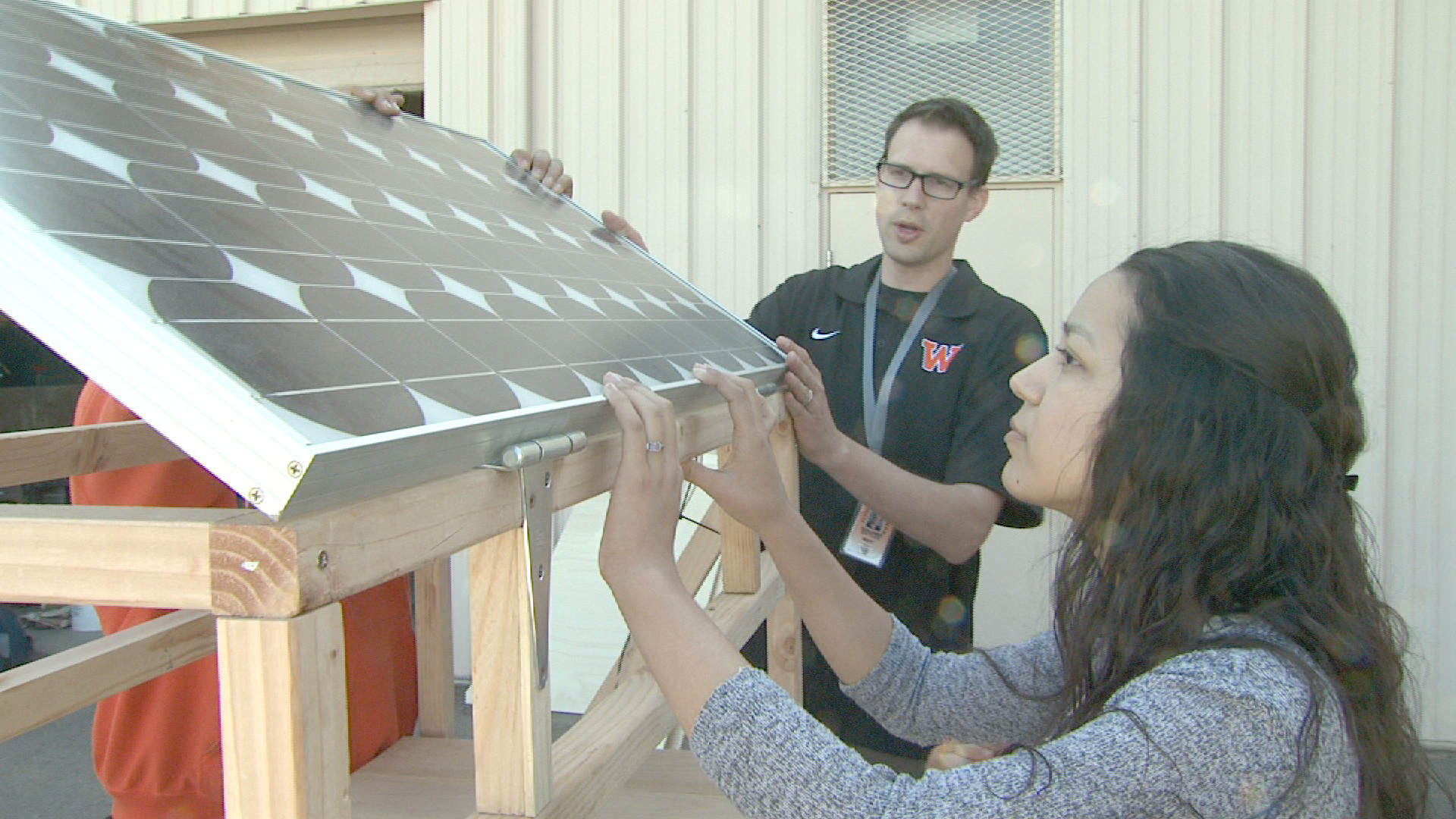 Clean Energy and Fuel Intensive Course at West Generation Academy builds solar cell phone charger as a final project.