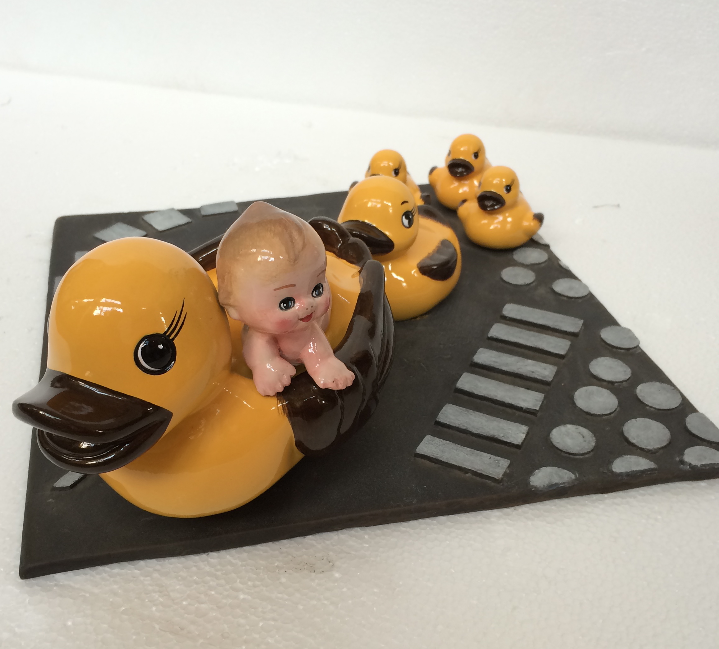 The Conrad Hotel has a yellow ducky in each bathroom - Poller takes it to bed in bronze