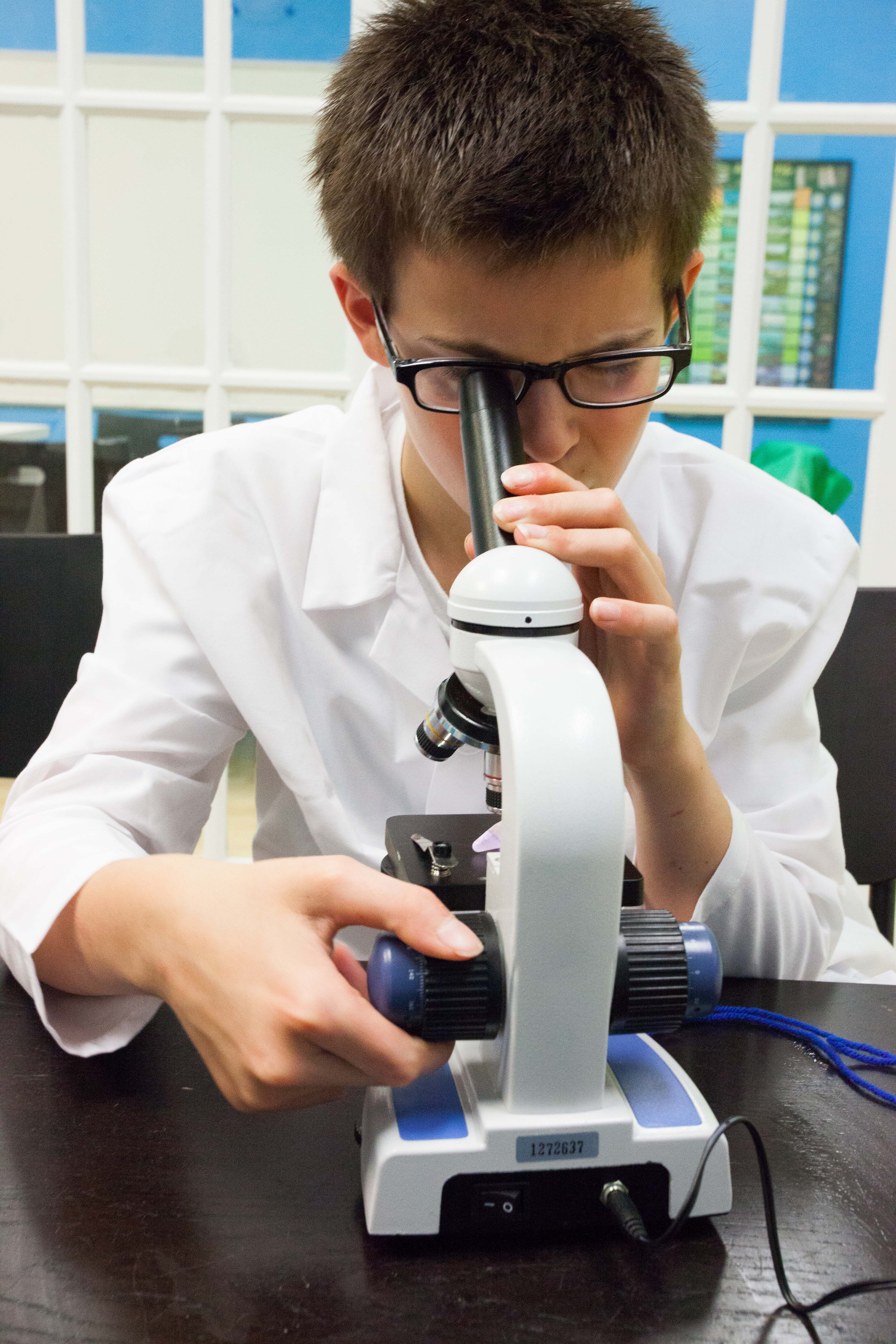 Local middle school scientist studying DNA samples at Ideaventions in Oakton, VA.