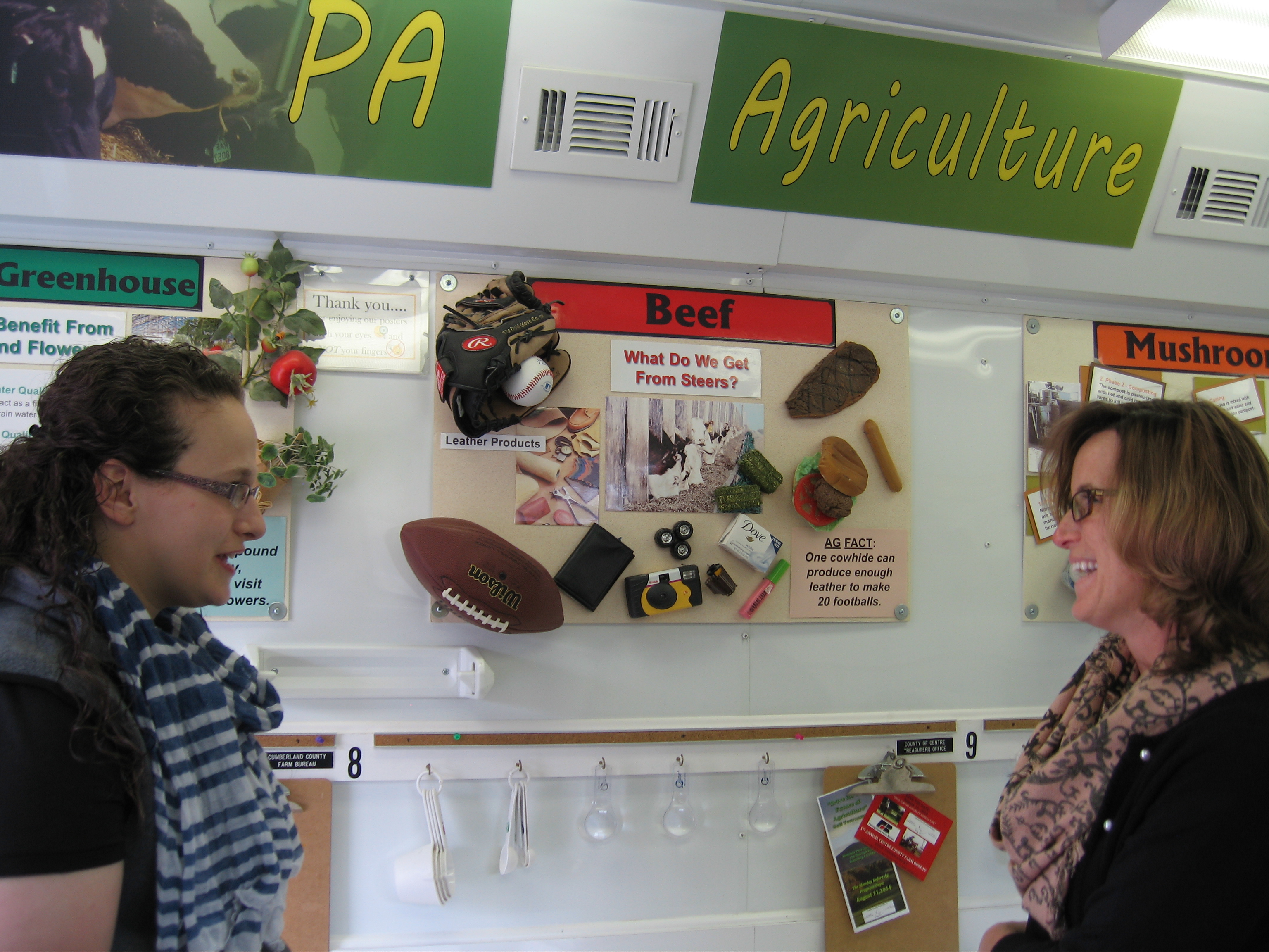 Penn State Collegiate Farm Bureau member Nicole McCord and Centre Hall Elementary Principal Danielle C. Yoder discuss ag education during a recent PA Friends of Ag Foundation Mobile Ag Lab visit.