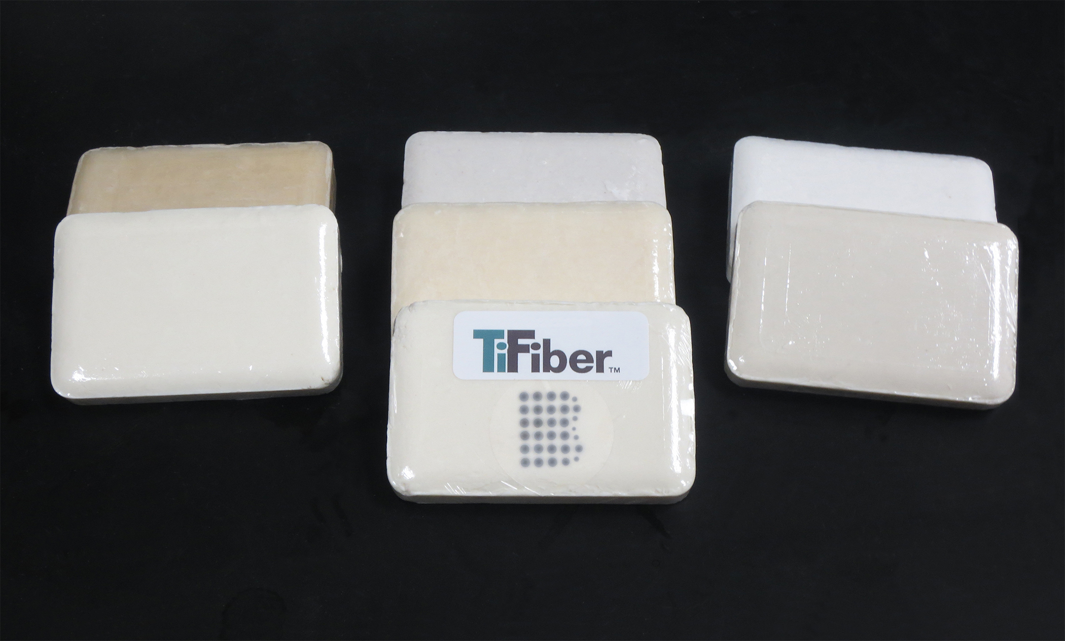 Pictured are several of bars of soap created jointly by Bradford Soap Works and TiFiber to be used in testing.  TiFiber is further developing antimicrobial technology that is safe and effective.
