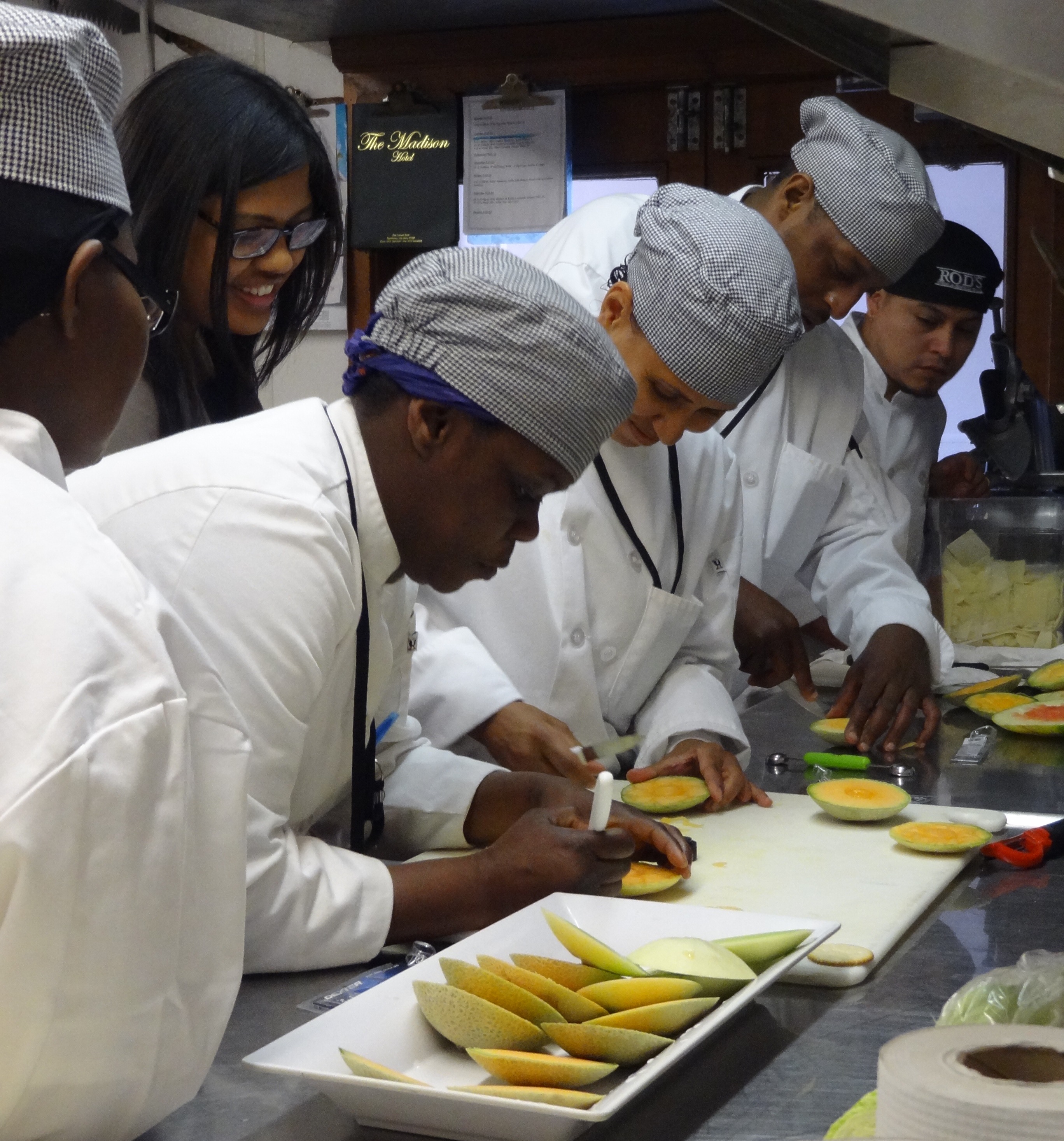 Culinary students try their hand at fruit carving