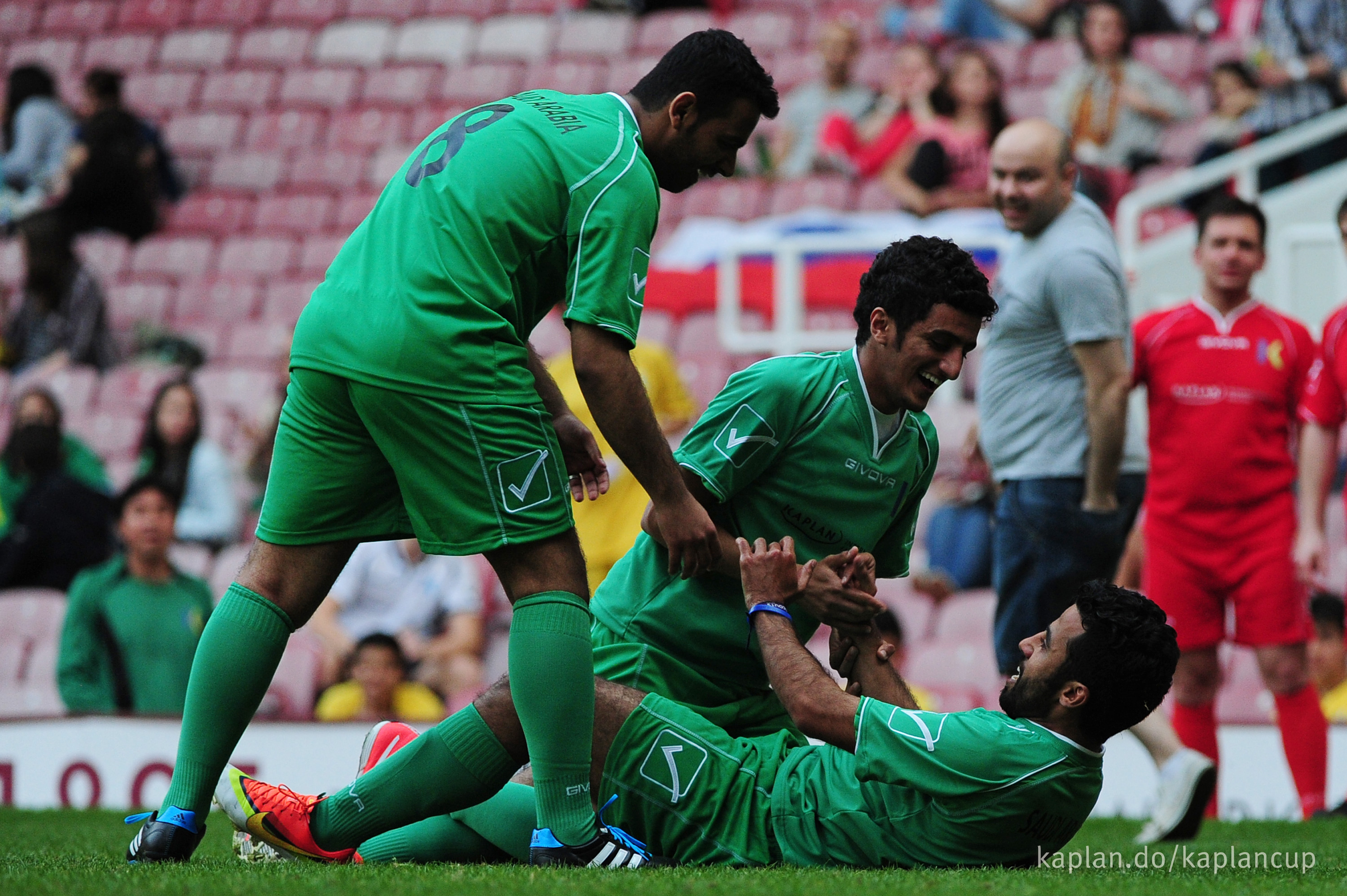 Saudi Arabia celebrate a goal.