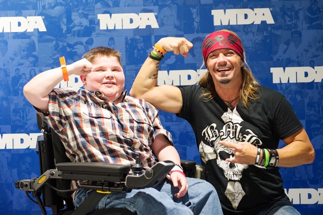 Bryson Foster and Bret Michaels having some fun posing for the cameras at the 27th annual Ride for Life on May 3.