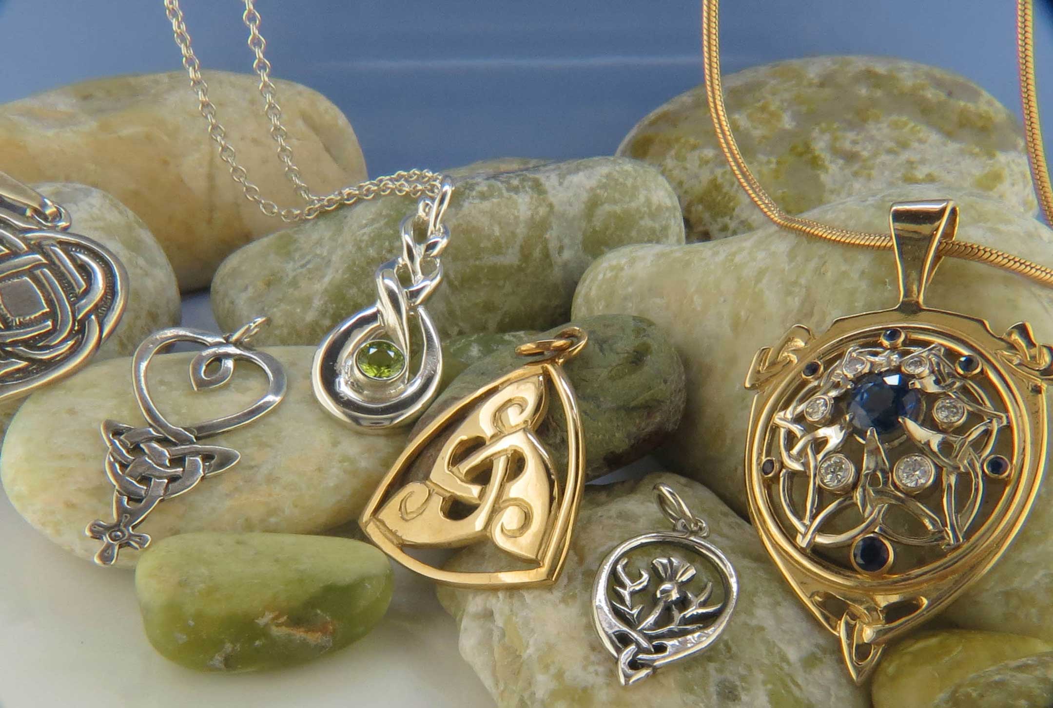 Unique Celtic jewelry in sterling silver and 14K gold crafted by Walker Metalsmiths.