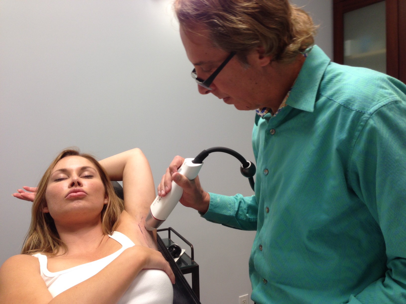 Dr. Steven Weiner treating axilla for sweating using the Infini