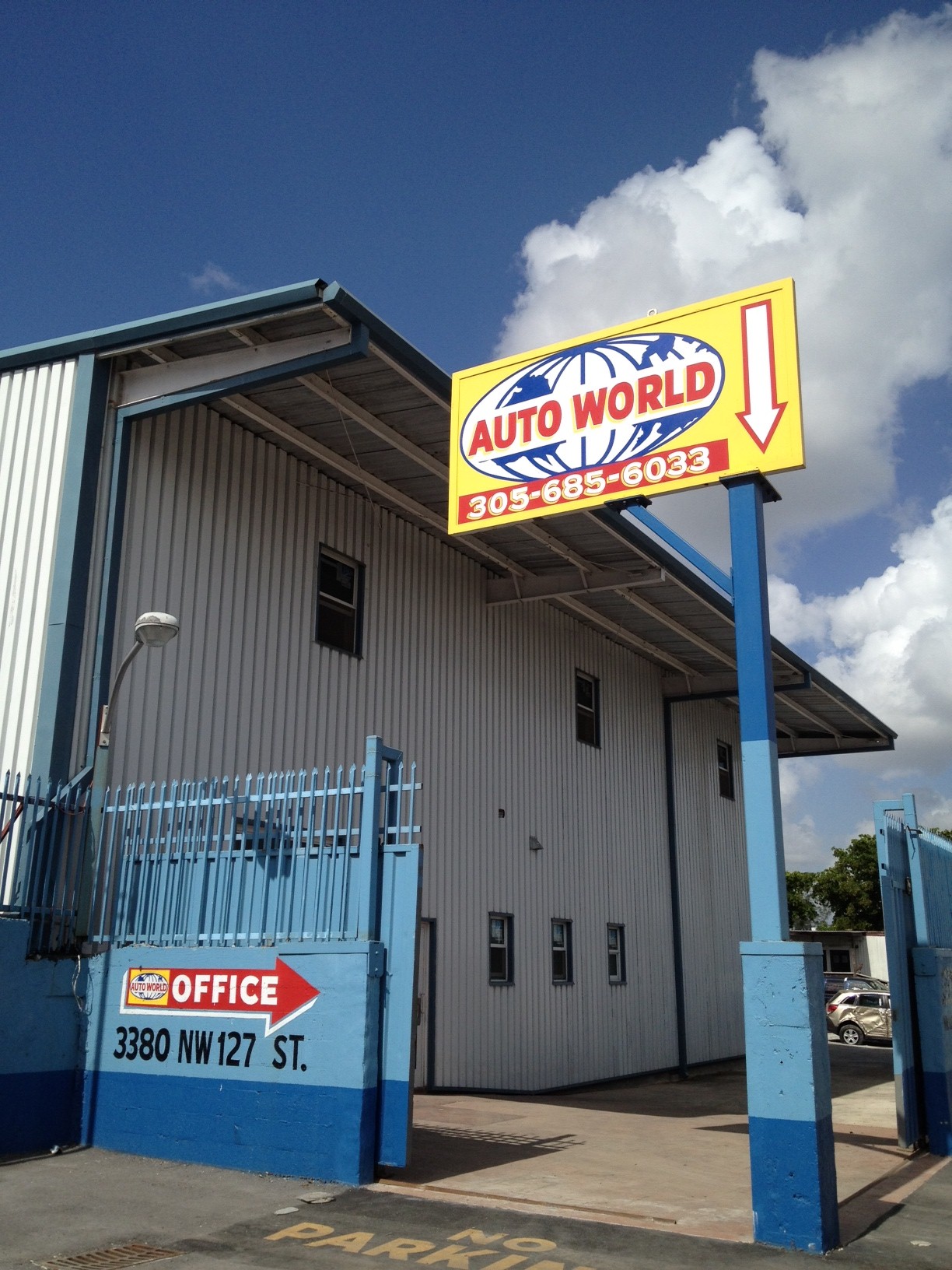 Front View of a New Building for Autoworld Used Auto Parts