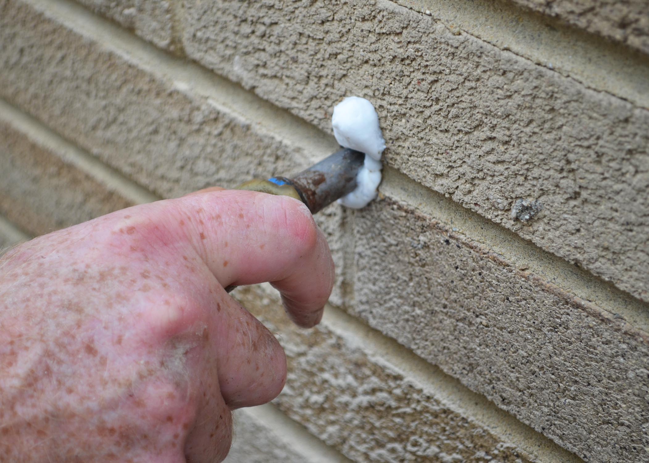 Installation--Foam Injected into Brick Wall