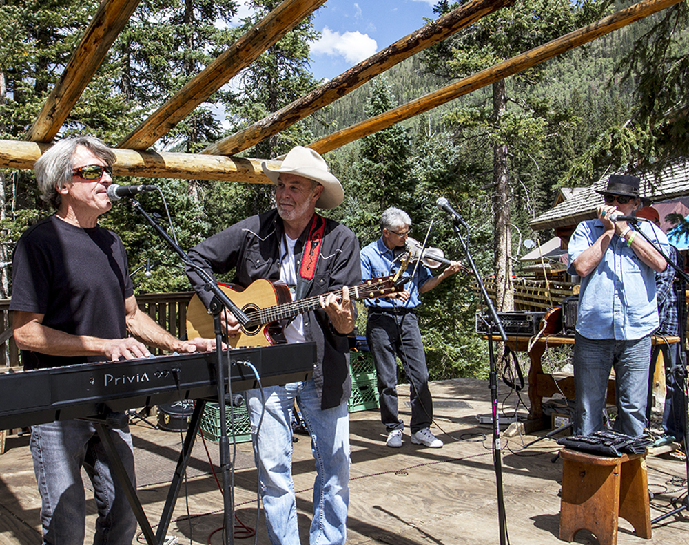 Summer outdooor music at The Bavarian Lodge and Restaurant, Taos Ski Valley.