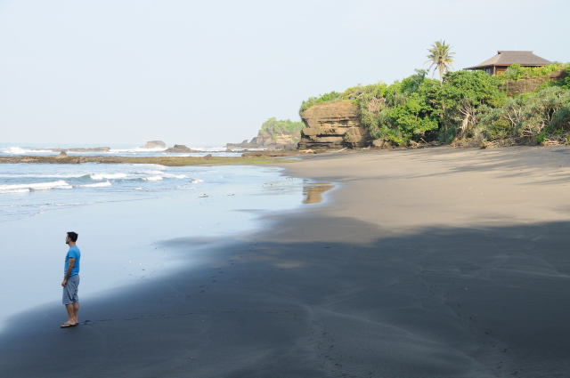 Pristine beach in Bali, with luxury vacation rental in background