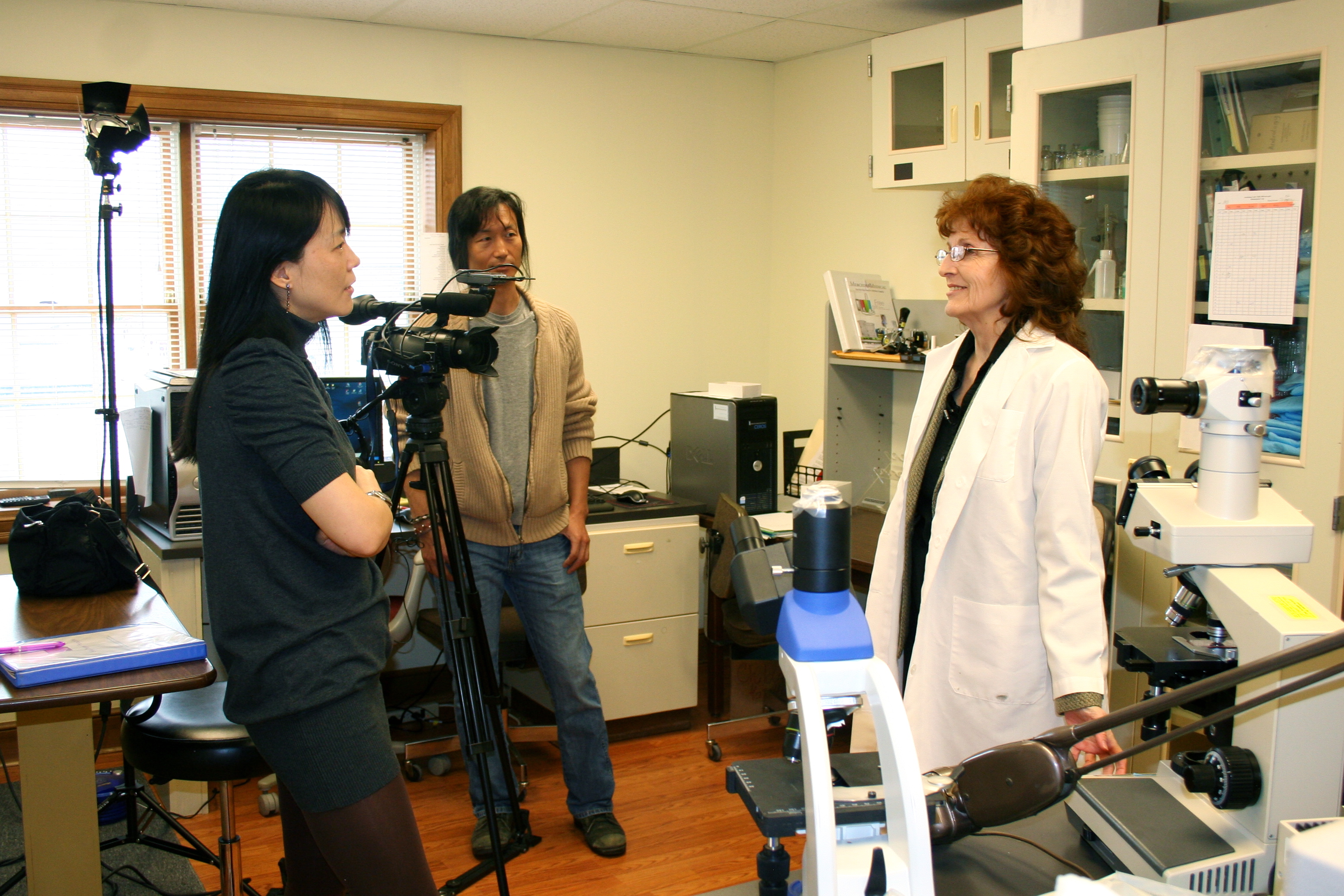 Dr. Lani Burkman is interviewed by South Korean reporter about male infertility