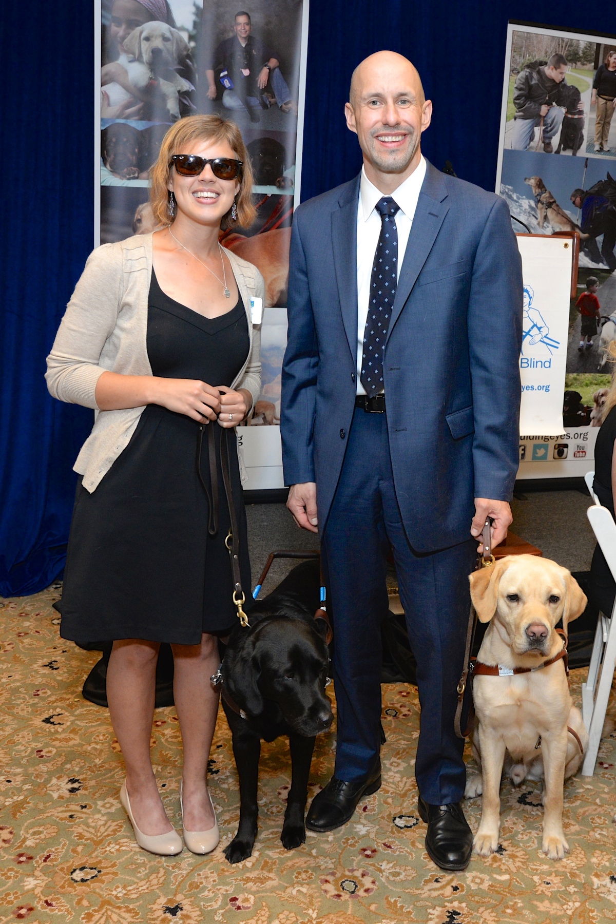 Guiding Eyes graduate Abbey Lanier and Thomas Panek (of South Salem), president & CEO, with Guiding Eyes dogs Alexa (left) and Gus at the 37th annual Guiding Eyes for the Blind Golf Classic.