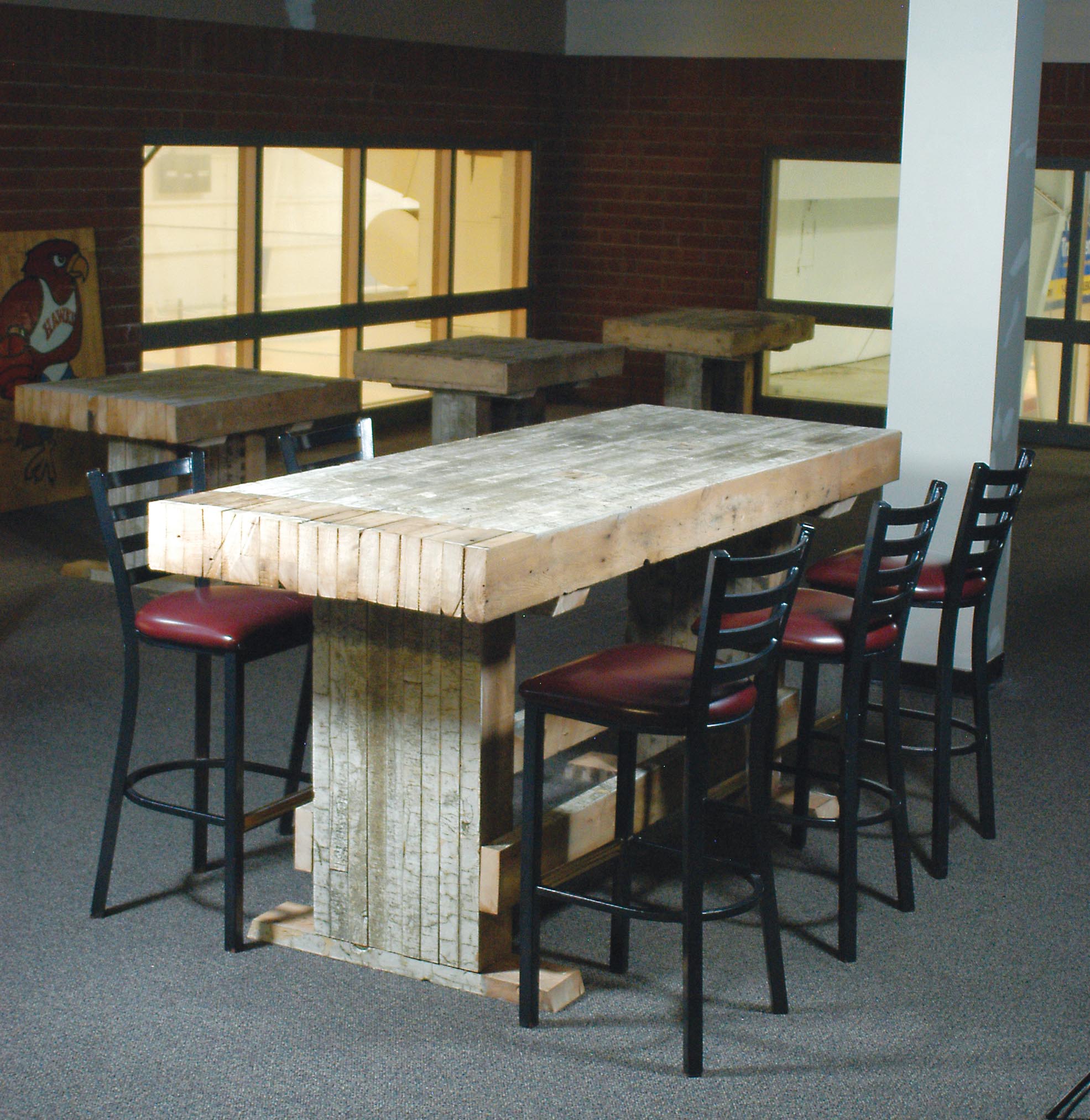 Pub Tables at CENTER St. Louis Use 100% Reclaimed Hemlock