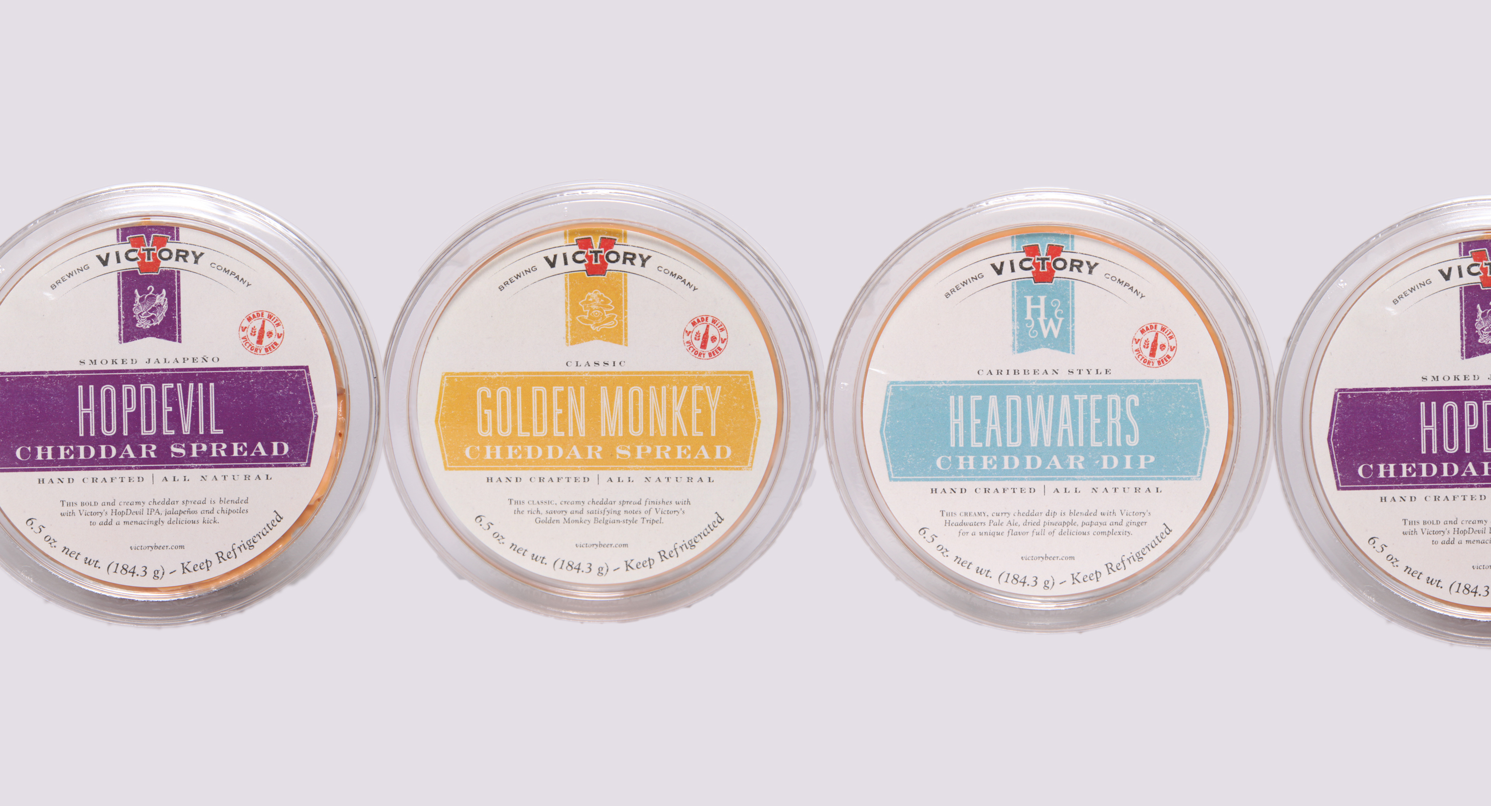 Victory Brewing Company introduces line of craft beer-inspired gourmet cheddar cheese spreads at Whole Foods Markets.