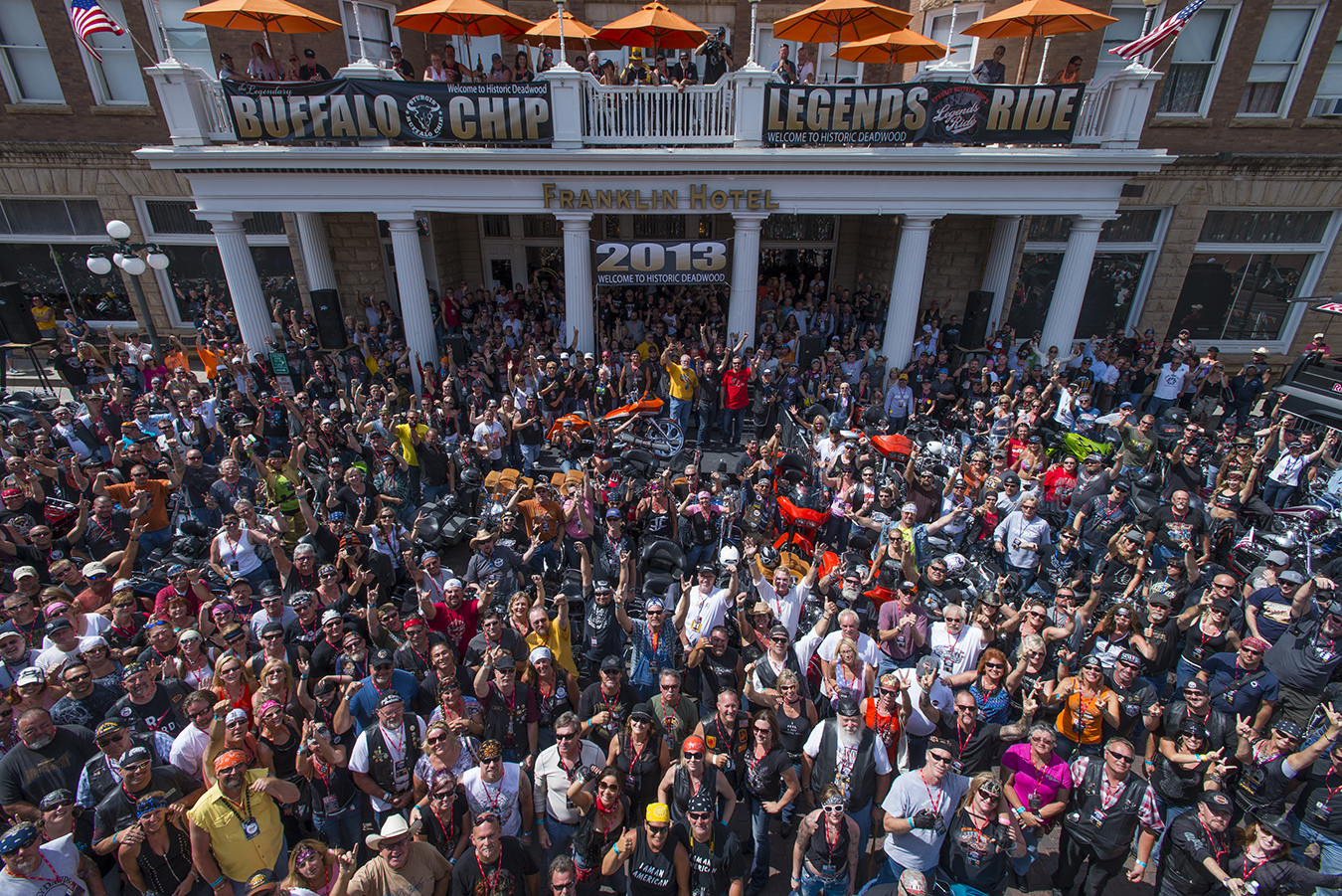 Riders gather in front of Deadwood's historic Franklin Hotel before the start of the 2013 Legends Ride to the Buffalo Chip.