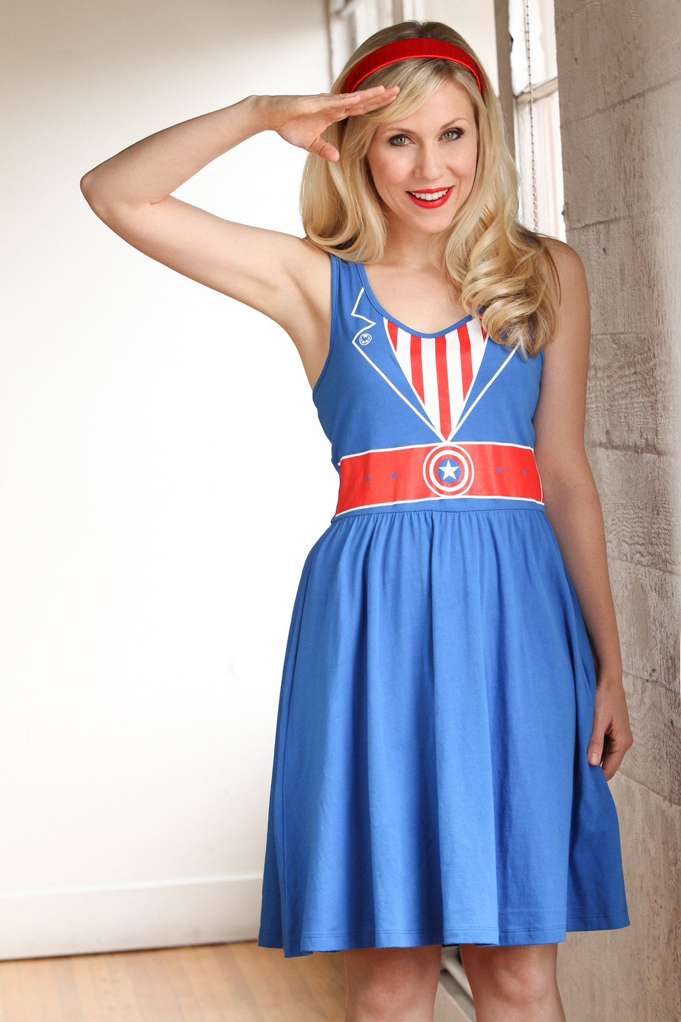 Inspired by Captain America's uniform and the USO girls, Her Universe took elements from both and came up with this dress design! Feel like the First Avenger in this fun A-line dress.
