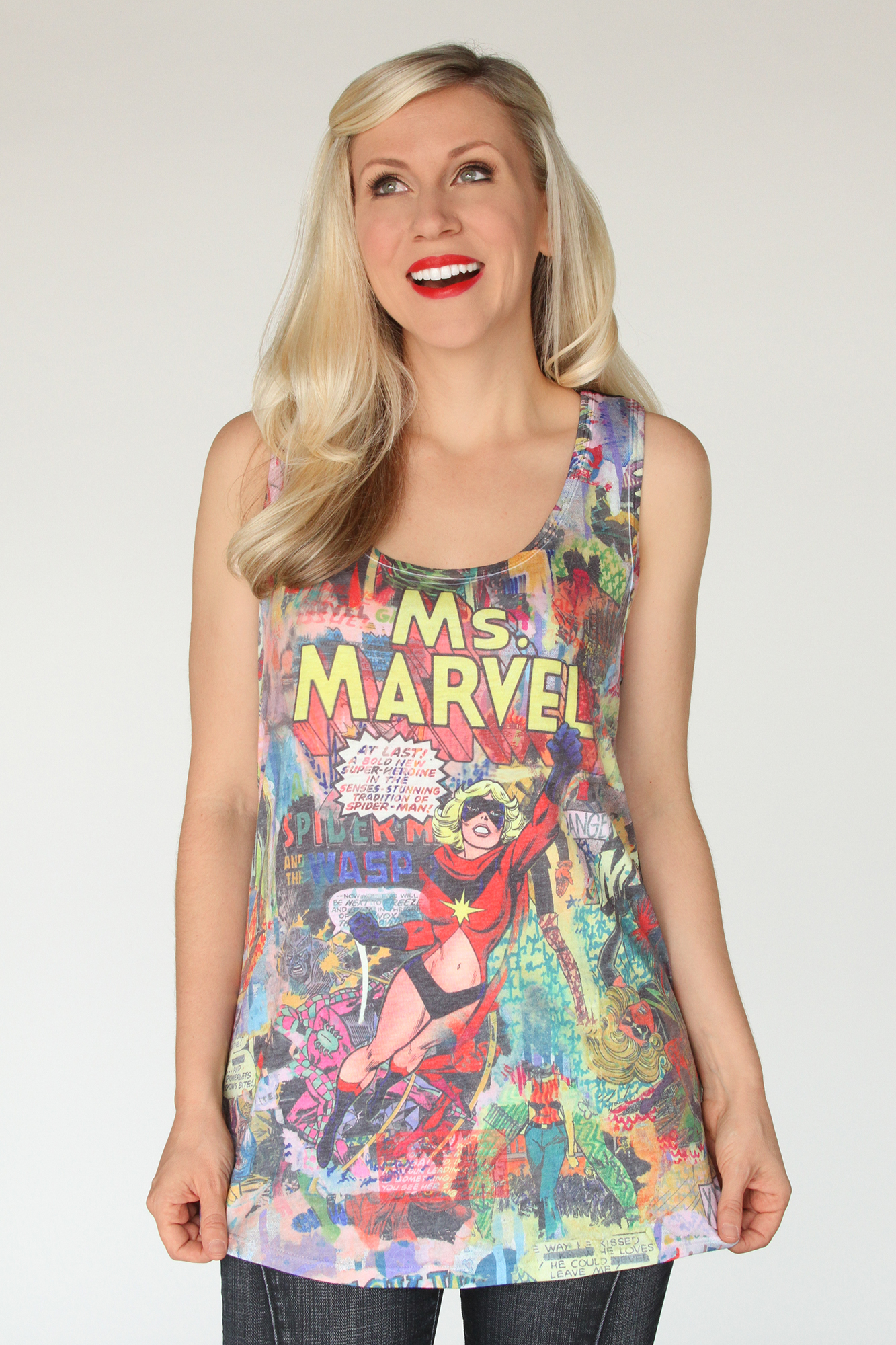 Her Universe has designed this beautiful Ms. Marvel art piece as a part of the graffiti collection. Featuring a collage of the women of Marvel with super heroine Ms. Marvel highlighted in the center.