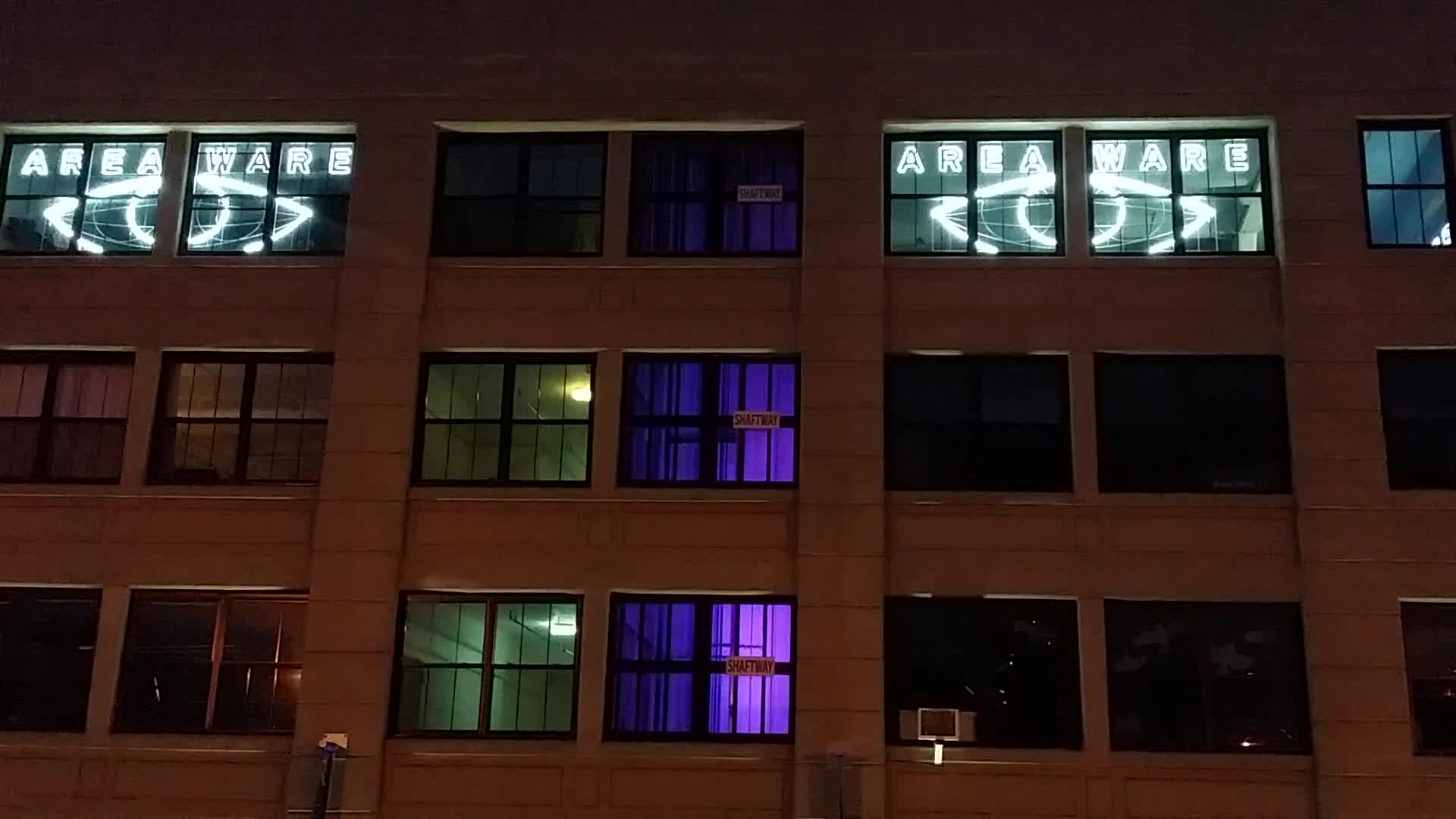 Areaware's neon eyes peering out of its office over looking the Williamsburgh bridge in Brooklyn, NY