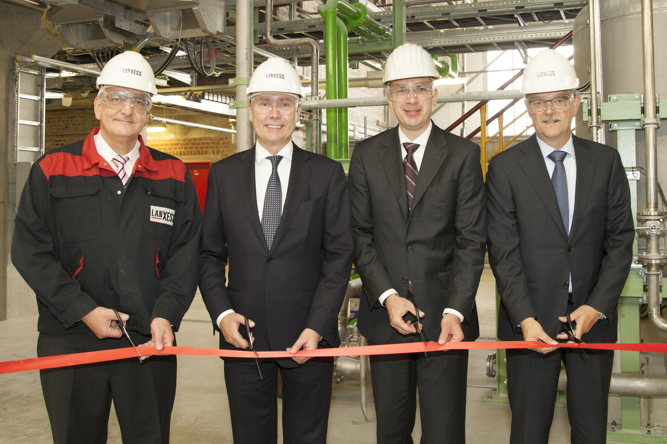 Official inauguration of the new production line for Chloroprene Rubber in Dormagen, Germany: (from left) Ralf Tappe, Site Manager, Board member Werner Breuers, Stefan Rittmann, Head of Business Line Chloropren Rubber, Jan Paul de Vries, Head of High Performance Elastomers business unit. Photo: LANXESS AG