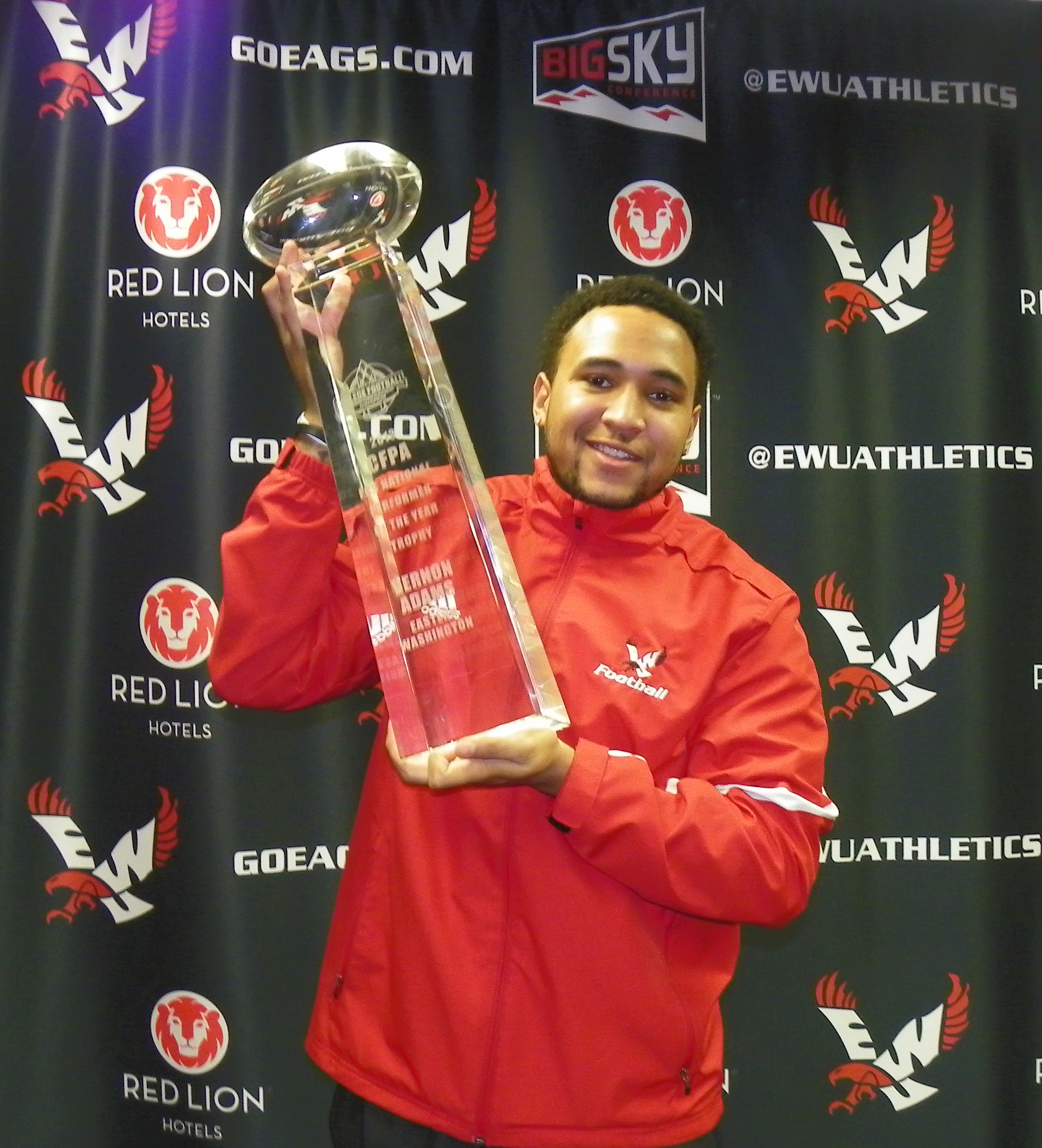 Vernon Adams lifts the CFPA Trophy