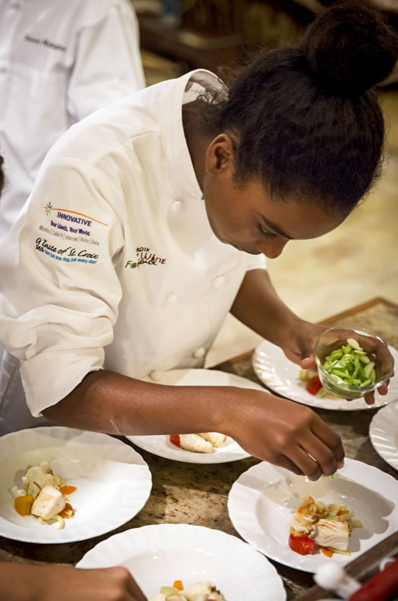 Chef Todd Gray (not shown) of Washington, DC worked wiht local students to prepare an incredible Cork & Fork dinner. Photo by Lindsay Kammerzelt.