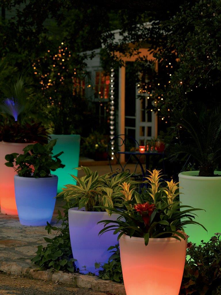 Solar illuminated planters can help light up your garden party at night.
