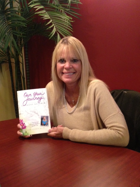 Lyn Hogrefe with copy of her book. (Photo Provided)