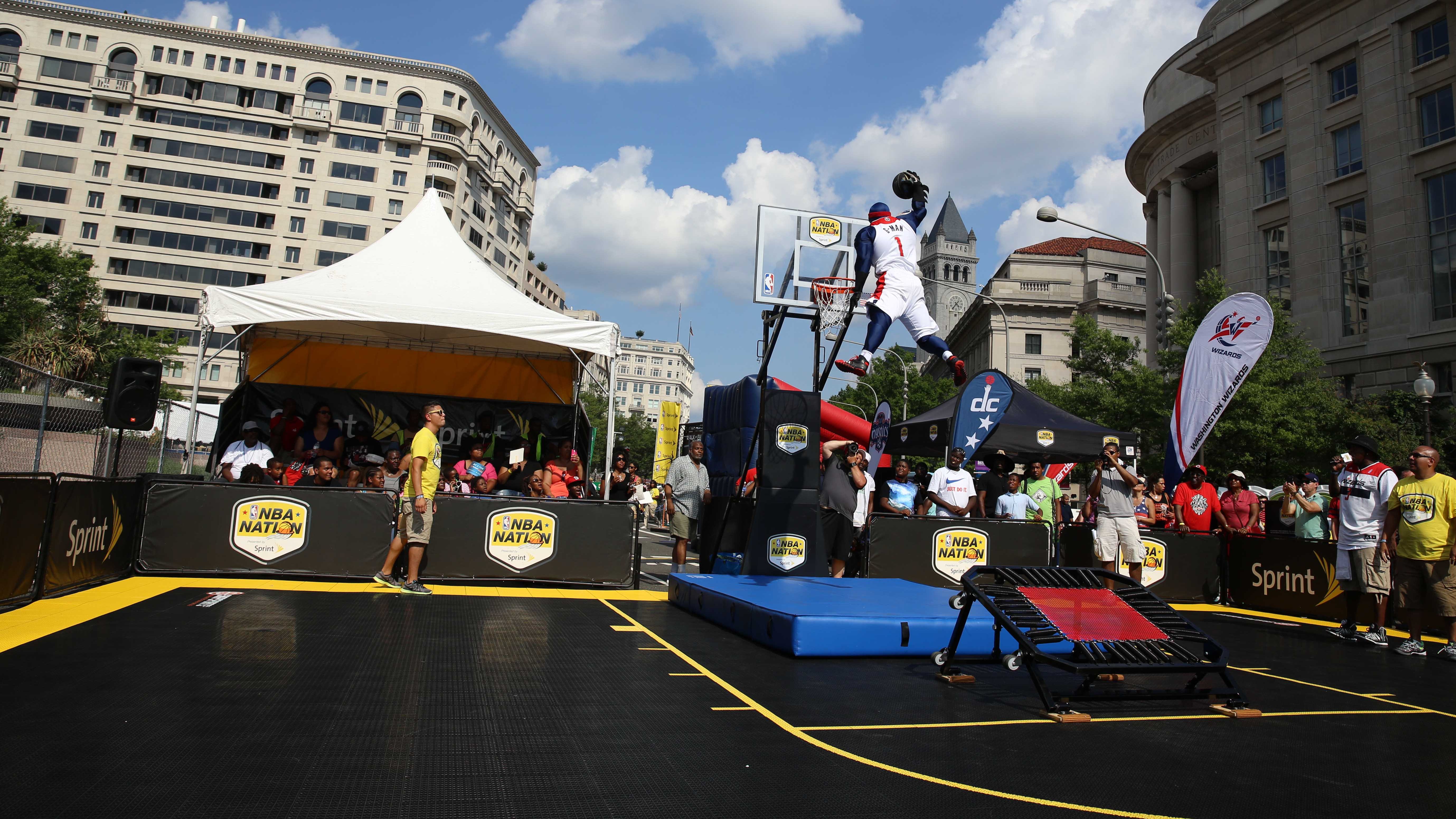 Washington Wizards Mascot G-Man dunks during an NBA Nation Tour event held on SnapSports BounceBack ShockTower Surface.
