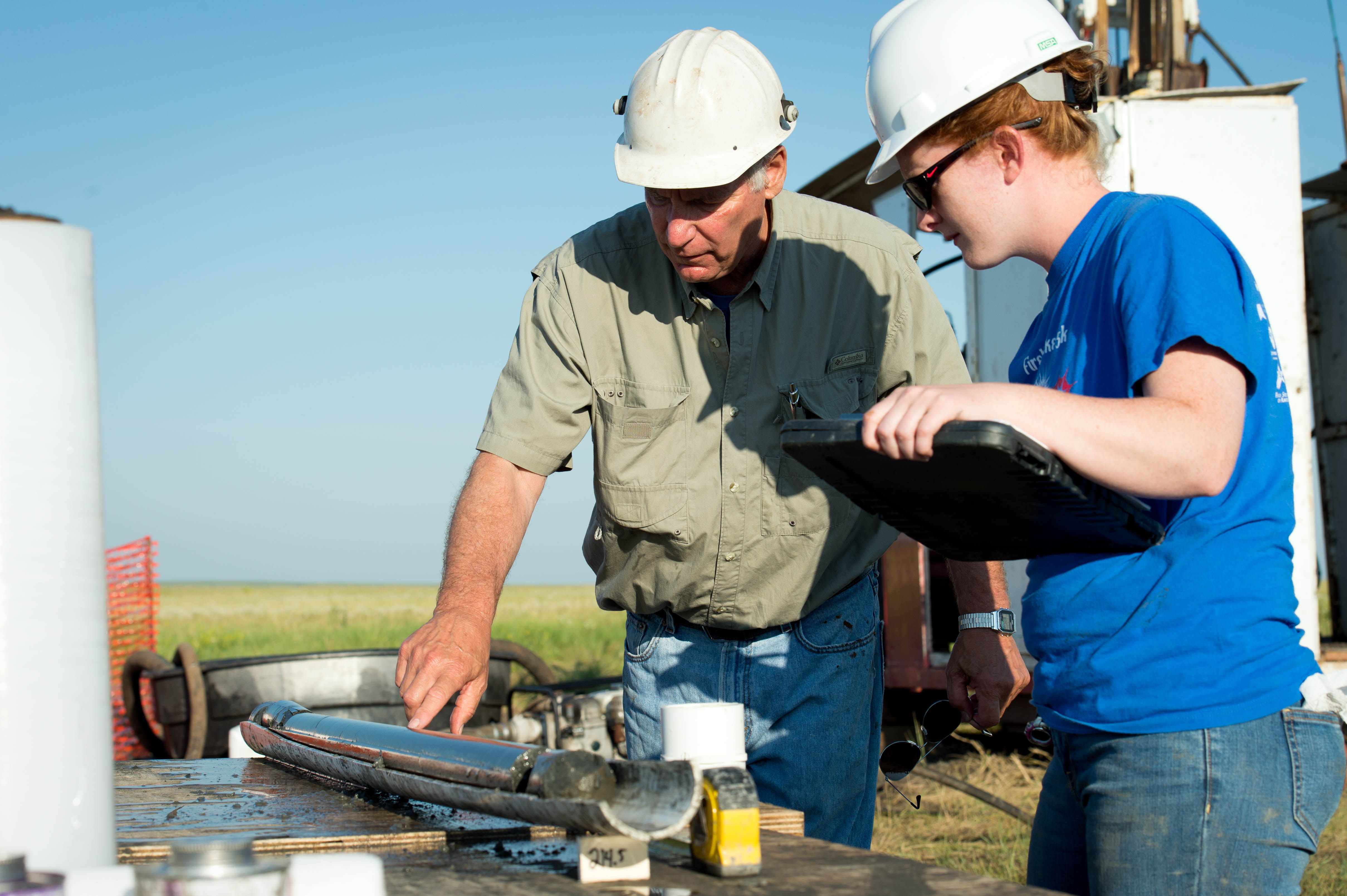 William Roggenthen, Ph.D., South Dakota School of Mines & Technology research scientist, and Amy Freye, Mines graduate student, prepare shale core samples for advanced laboratory testing.