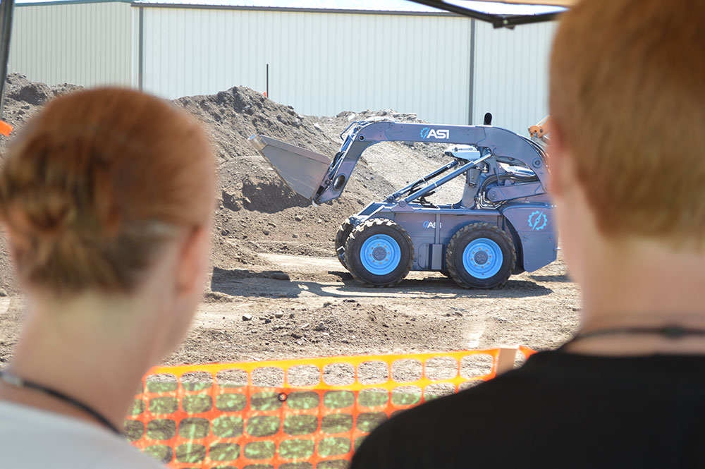 Participants in the Cache Valley Robotics Fair were able to try their hand at controlling robotic vehicles.