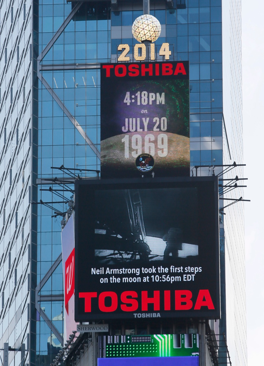Toshiba celebrates the 45th anniversary of the Apollo 11 space mission with a broadcast of two historic NASA videos on its Toshiba Vision Screens high atop One Times Square, Sunday, July 20, 2014. (Ph