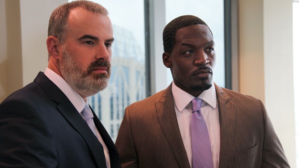 (L to R) Coleman (Alex Kendrick) stands with Tony (T.C. Stallings), his top pharmaceutical salesman, after a tense board meeting in downtown Charlotte. (Courtesy of AFFIRM Films/Provident Films, Photo