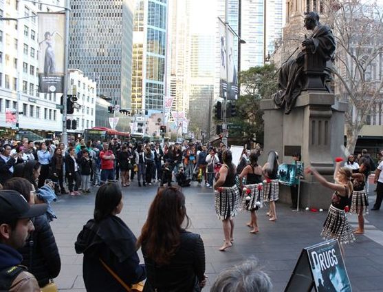 Hundreds stopped to enjoy the Kingi Family’s Maori songs and dances outside the Queen Victoria Building in Sydney and to learn the truth about drugs.