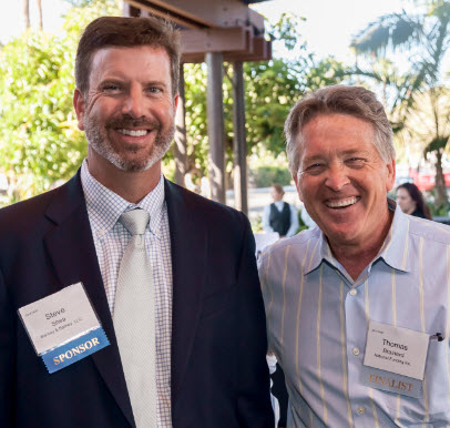 Event Gold Sponsor Barney & Barney’s Principal Steve Shea and National Funding Vice President of Marketing Tom Brainerd are seen networking at the Top 100 reception.