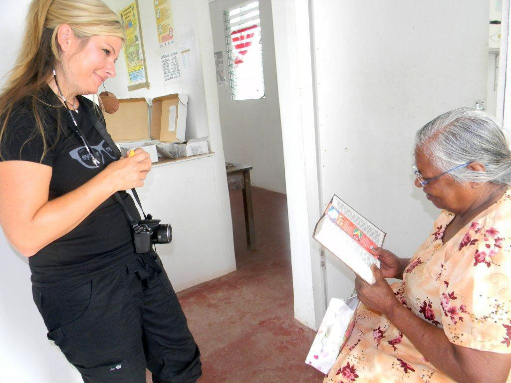 Staff from Eyes of Faith optical partner EyeDesigns Vision delivers Wear & Share® donations in Guyana.