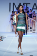 An IMTA Model walks during the Designer Fashion Show