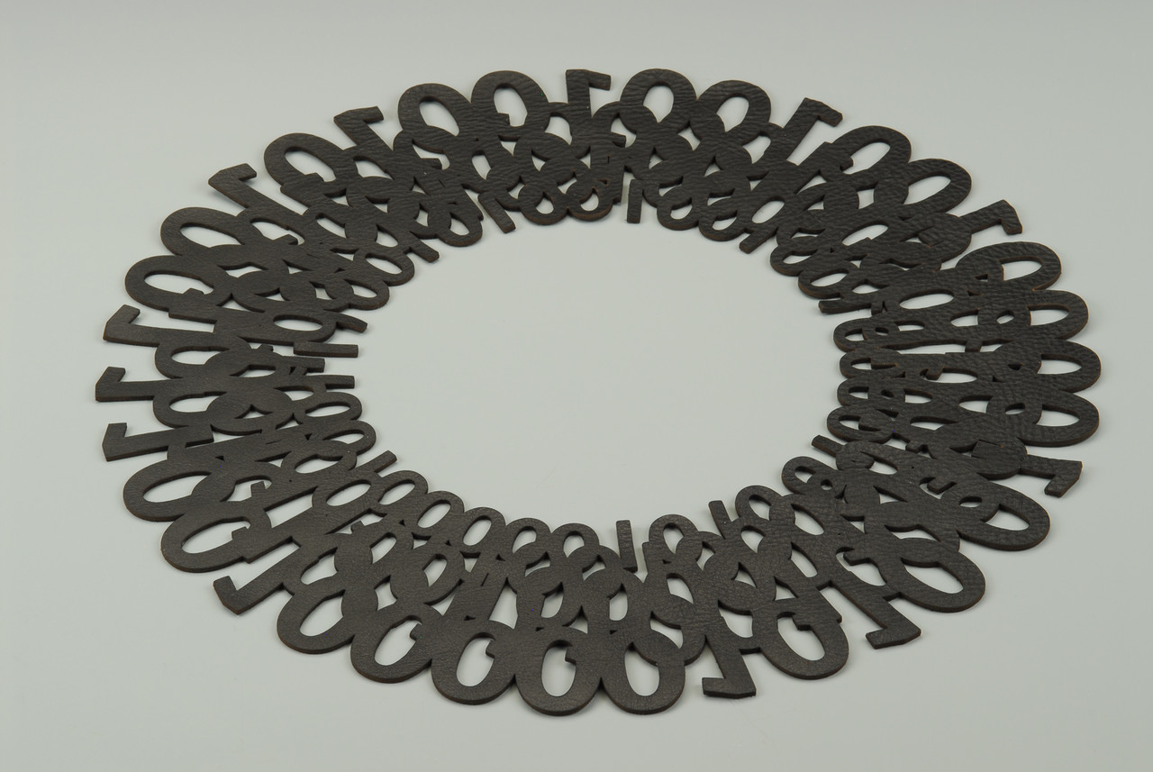 Nancy Slagle, "Binary," 2014. Laser-cut rubber. 15 x 15 x 1/16 inches. Photo by Robly A. Glover.