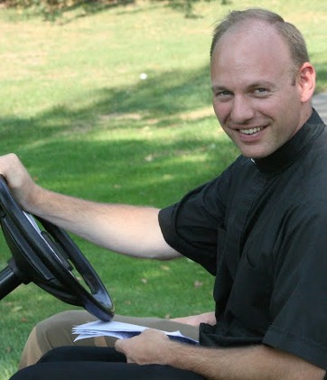Father Thomas will leave the drums at home and be happy to drive the golf cart!