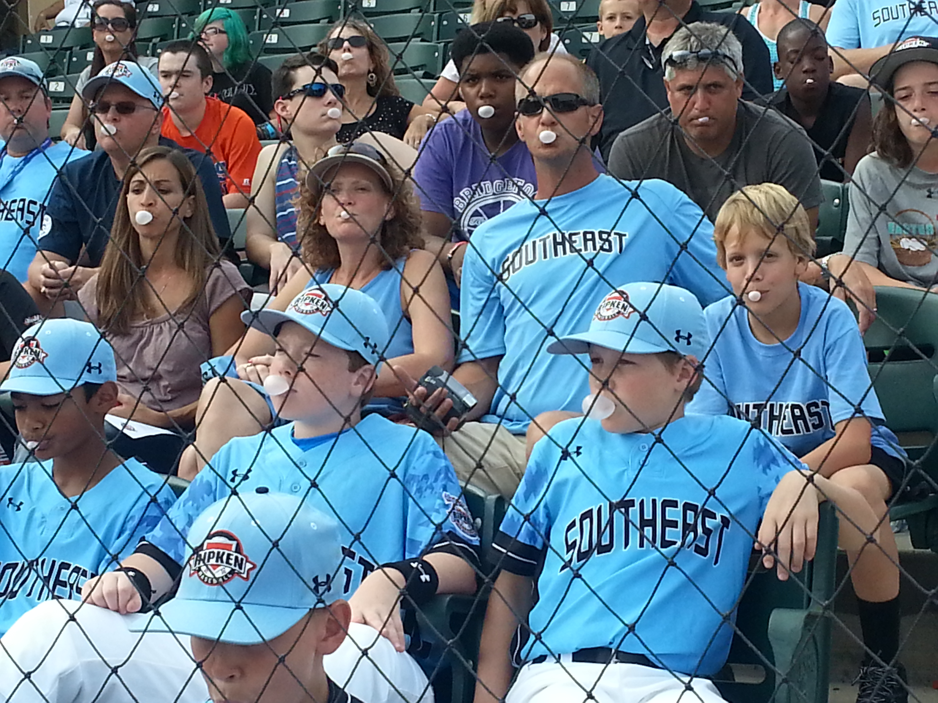 During the opening ceremonies of the Cal Ripken World Series, team members, their families and fans blow Big League Chew Bubble Gum bubbles as they help set the new GUINNESS WORLD RECORDS® title.