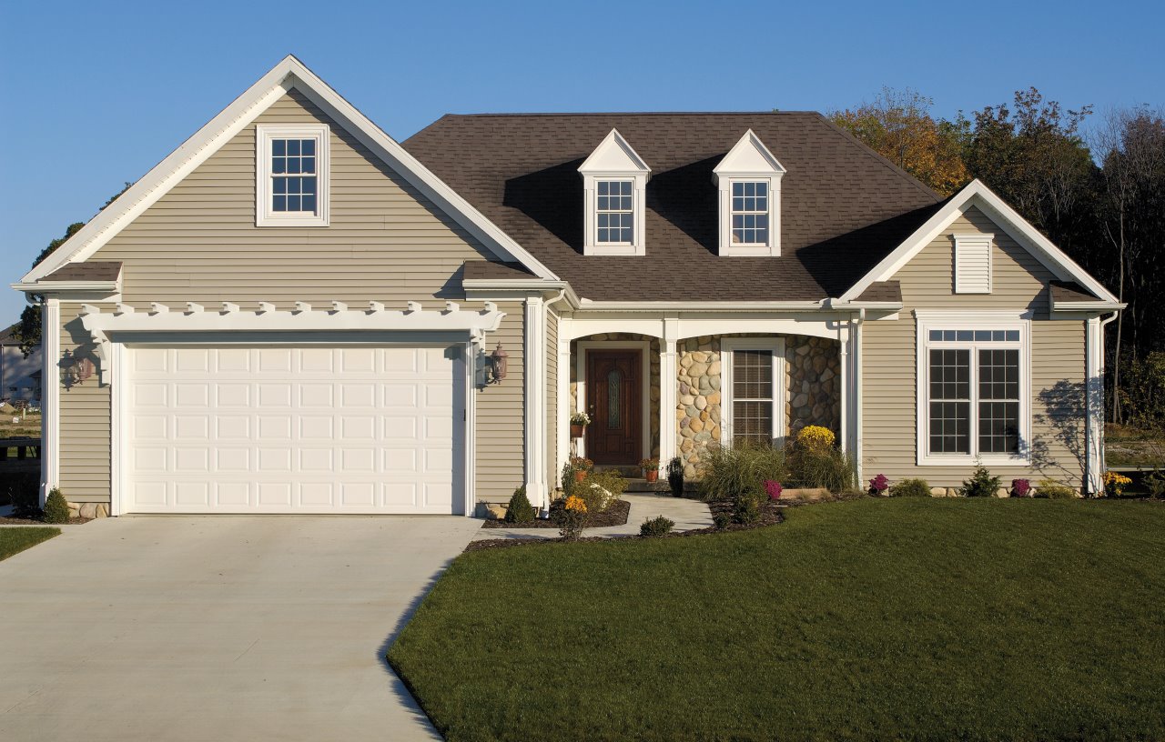 Fypon trellis system around garage door.