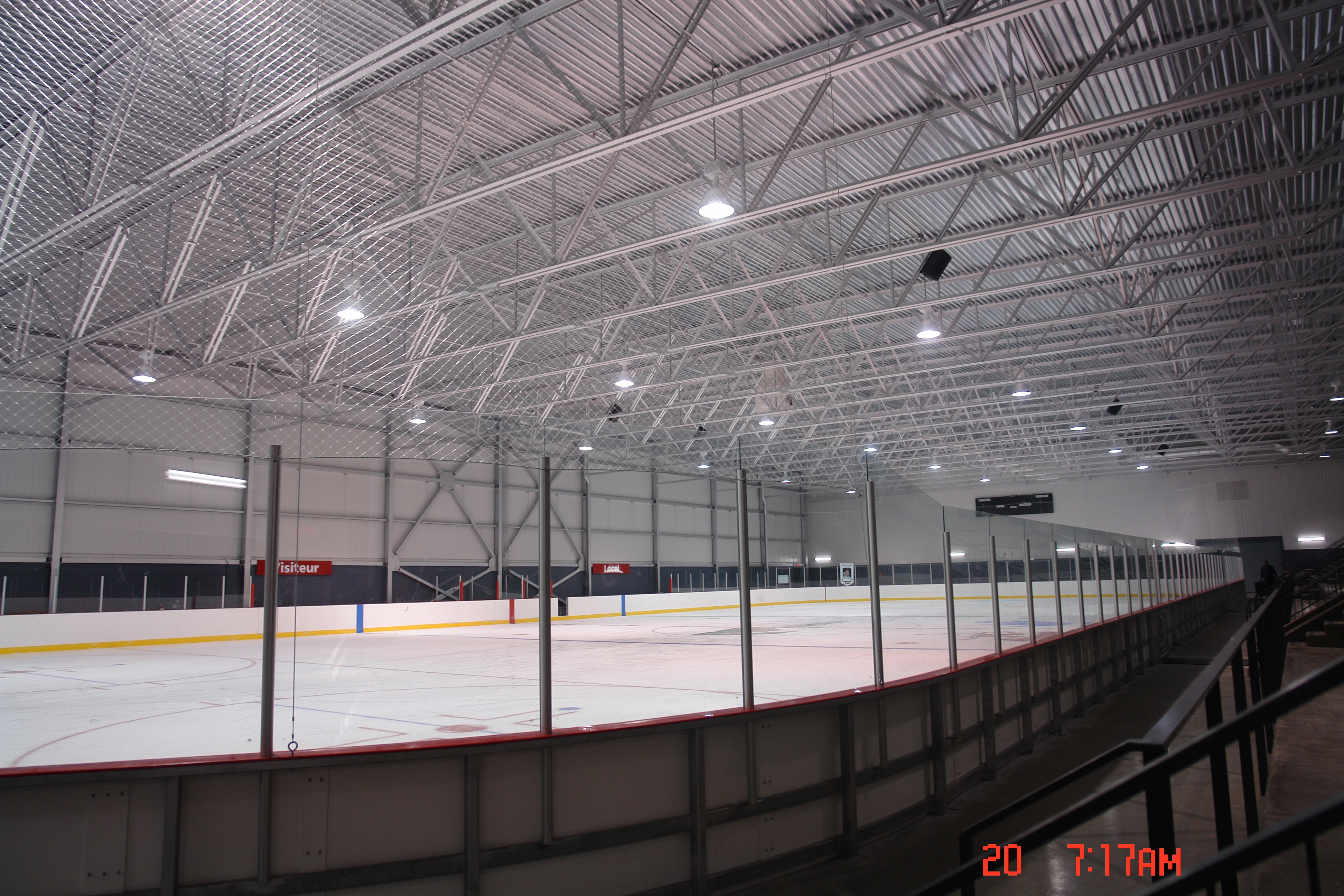 LO/MIT IRCCS Spray-applied to underside of steel roof decking and trusses of Montreal Canadiens' ice hockey practice arena, the Complexe Sportif Bell.