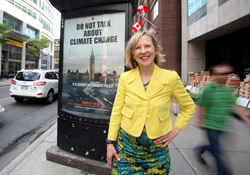 Franke James in front of her "Do Not Talk about Climate Change", Ottawa May 2013